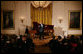 President George W. Bush and Mrs. Laura Bush listen to tenor Ronan Tynan performing in the East Room of the White House Sunday evening, Feb. 25, 2007, during the State Dinner in honor of the Nation’s Governors. White House photo by Shealah Craighead