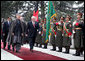 Vice President Dick Cheney and Afghan President Hamid Karzai review an honor guard, Tuesday, Feb. 27, 2007 during the Vice President's arrival to the presidential palace in Kabul. White House photo by David Bohrer