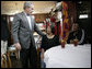 President George W. Bush meets with New Orleans Upper Ninth Ward resident Ethel Williams, left, and her daughter, Wanda, following a lunch meeting Thursday, March 1, 2007 in New Orleans with city and state officials, to talk about the rebuilding progress of areas devastated by Hurricane Katrina. President Bush met Ethel Williams and toured her hurricane damaged home in April 2006. White House photo by Eric Draper