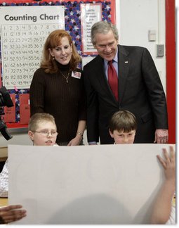 President George W. Bush meets with teacher Teri Sanders and students of her fifth grade U.S. History class at the Silver Street Elementary School in New Albany, Ind., Friday, March 2, 2007.  White House photo by Eric Draper