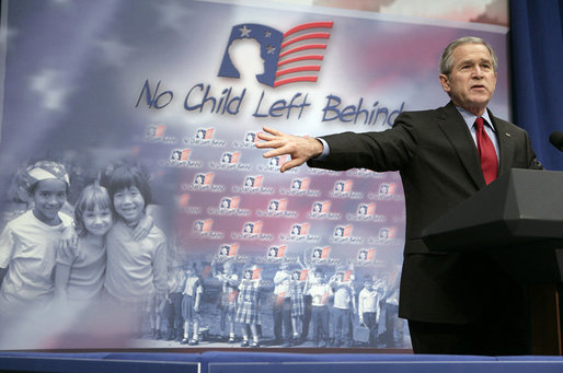 President George W. Bush gestures as he addresses his remarks to students, faculty and guests at the Silver Street Elementary School in New Albany, Ind., Friday, March 2, 2007, urging Congress to reauthorize the No Child Left Behind law. White House photo by Eric Draper