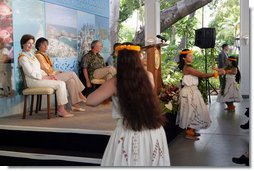 Mrs. Laura Bush and Hawaiian Gov. Linda Lingle watch traditional Hawaiian dancers at the Northwest Hawaiian Islands Marine National Monument Naming Ceremony, Friday, March 2, 2007 in Honolulu, where Laura Bush unveiled the new Hawaiian name as Papahanaumokuakea Marine National Monument. The name for the recently established marine sanctuary was developed by state and federal officials working with native Hawaiian leaders.  White House photo by Shealah Craighead