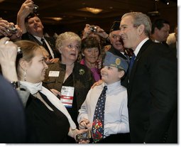 President George W. Bush poses for a photo after addressing the American Legion 47th National Convention, Tuesday, March 6, 2007, in Washington, D.C.  White House photo by Eric Draper
