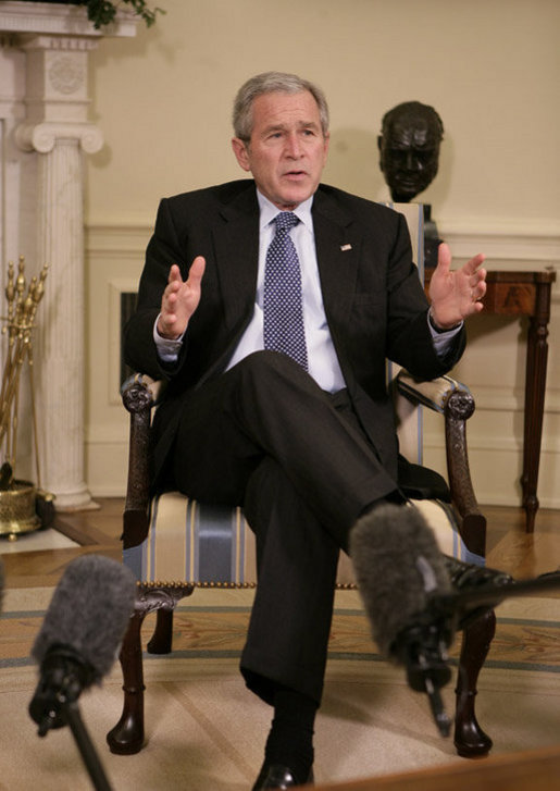 President George W. Bush speaks to members of the media during his meeting with former U.S. Sen. Bob Dole and former U.S. Health and Human Services Secretary Donna Shalala in the Oval Office, Wednesday, March 7, 2007. Dole and Shalala will co-chair the President’s Commission on Care for America’s Returning Wounded Warriors, a bipartisan panel that will investigate problems at the nation's military and veterans hospitals. White House photo by Eric Draper