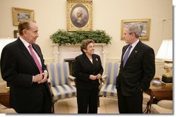 President George W. Bush meets with former U.S. Sen. Bob Dole and former U.S. Health and Human Services Secretary Donna Shalala in the Oval Office, Wednesday, March 7, 2007, who will co-chair the President’s Commission on Care for America’s Returning Wounded Warriors.  White House photo by Eric Draper