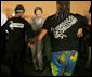 Mrs. Laura Bush laughs as she joins performers Friday, March 9, 2007, during a visit to Meninos do Morumbi, a Sao Paulo center that offers youths alternatives to drugs and crime. White House photo by Eric Draper