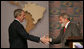 President George W. Bush and Brazil's President Luiz Inacio Lula da Silva shake hands Friday, March 9, 2007, after a joint press availability in Sao Paulo. The two leaders met for the day and discussed many topics, including biofuels, energy, and international affairs. White House photo by Paul Morse