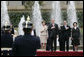 President George W. Bush and Mrs. Laura Bush participate in an arrival ceremony with Colombian President Alvaro Uribe and his wife Lina Moreno at Casa de Narino in Bogotá, Colombia, Sunday, March 11, 2007. White House photo by Eric Draper
