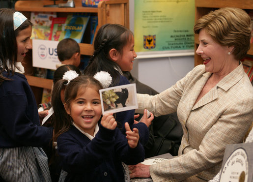 A little girl holds up a picture of Mrs. Bush's cat, Willie, during Mrs. Bush's visit to Rafael Pombo Foundation Sunday, March 11, 2007, in Bogotá, Colombia. White House photo by Shealah Craighead