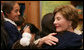 Mrs. Laura Bush hugs a student during her a visit to Rafael Pombo Foundation Sunday, March 11, 2007, in Bogota, Colombia. White House photo by Shealah Craighead