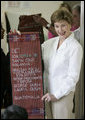 Mrs. Laura Bush holds a banner presented to her during a visit Monday, March 12, 2007, to the Dr. Richard Carroll Municipal Library in the Town Square of Santa Cruz Balanya, Guatemala. White House photo by Paul Morse
