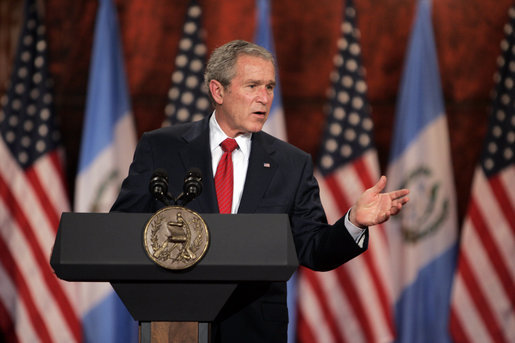 President George W. Bush delivers a point during a joint press availability Monday, March 12, 2007, with Guatemalan President Oscar Berger at the Palacio Nacional de la Cultura in Guatemala City. The President and Mrs. Bush joined the Bergers for dinner before departing Monday evening for Mexico. White House photo by Paul Morse