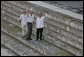 President George W. Bush and Mexico's President Felipe Calderon wave from the steps of the Uxmal Mayan ruins Tuesday, March 13, 2007. White House photo by Paul Morse