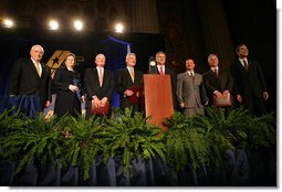 Vice President Dick Cheney, far left, stands with Secretary of Commerce Carlos Gutierrez, far right, and the 2006 Malcolm Baldrige National Quality Award recipients, Tuesday, March 13, 2007 during the 2006 Malcolm Baldrige National Quality Award Ceremony in Washington, D.C. From left the recipients are Kelli Loftin Price and Richard Norling of Premier Inc., San Diego, Calif.; Charles D. Stokes and John Heer of North Mississippi Medical Center of Tupelo, Miss.; John Cole and Terry F. May of MESA Products, Inc., Tulsa, Okla.  White House photo by David Bohrer
