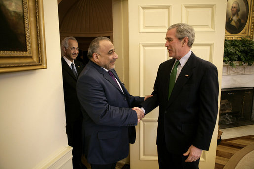 President George W. Bush welcomes Vice President Adil Abd Al-Mahdi of Iraq to the Oval Office Thursday, March 15, 2007. White House photo by Eric Draper