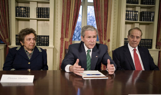 President George W. Bush meets with former U.S. Sec. of Health and Human Services Donna Shalala, left, and former U.S. Sen. Bob Dole, co-chairs of the President's Commission on Care for America's Returning Wounded Warriors, Friday, March 16, 2007 at the White House. White House photo by Eric Draper