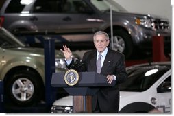 With a backdrop of new vehicles still on the line, President George W. Bush delivers remarks Tuesday, March 20, 2007, on energy initiatives during a tour of the Ford Motor Company - Kansas City Assembly Plant in Claycomo, Missouri. Said the President, " I believe that -- I call it Twenty Ten; in other words, reduce gasoline usage by 20 percent over 10 years. And I'm looking forward to working with both Republicans and Democrats to get it done."  White House photo by Eric Draper