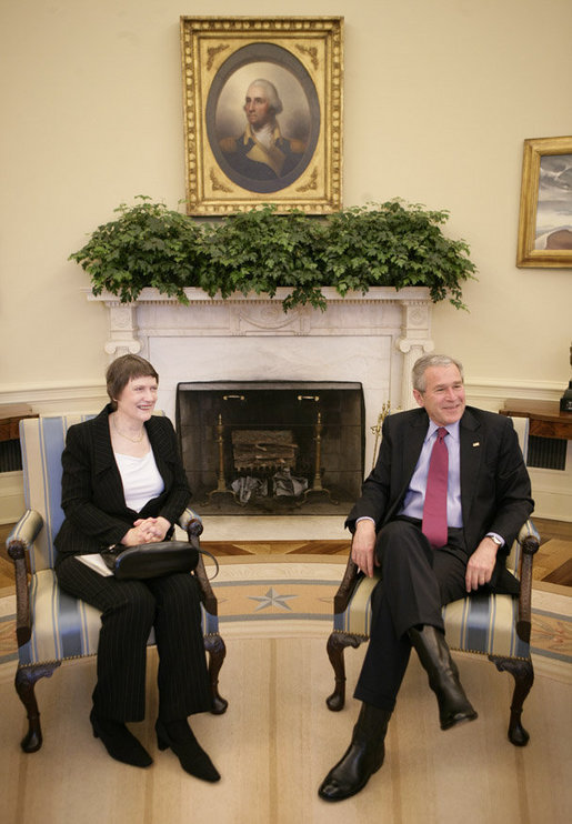 President George W. Bush and Prime Minister Helen Clark of New Zealand talk to reporters during their meeting in the Oval Office Wednesday, March 21, 2007. White House photo by Eric Draper