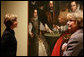 Mrs. Laura Bush takes a close look at a painting during tour an exhibit of Italian Women Artists from Renaissance to Baroque at the National Museum of Women in the Arts Thursday, March 22, 2007, in Washington, D.C. Also pictured is the museum's director Dr. Judy L. Larson. White House photo by Shealah Craighead