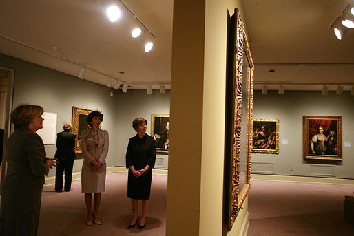 Mrs. Laura Bush and Mrs. Giovanni Castellaneta, wife of the Italian Ambassador to the United States, tour an exhibit of Italian Women Artists from Renaissance to Baroque at the National Museum of Women in the Arts Thursday, March 22, 2007, in Washington, D.C. They are guided by the museum's director Dr. Judy L. Larson, who is pictured at the far left. White House photo by Shealah Craighead