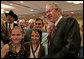 President George W. Bush poses for photos and meets guests following his remarks to the National Cattlemen’s Beef Association Wednesday, March 28, 2007 in Washington, D.C. White House photo by Joyce Boghosian