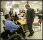 President George W. Bush talks with U.S. Army Staff Sgt. Joe Beimfohr and his fiancee Ana Rivera, both of Winchester, Tenn., located near Chattanooga Friday, March 30, 2007, during a visit to Walter Reed Army Medical Center in Washington, D.C. White House photo by Eric Draper