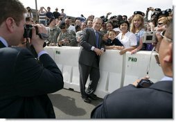 President George W. Bush poses for a photo with military personnel and their families before departing Fort Irwin, Calif., Wednesday, April 4, 2007. White House photo by Eric Draper