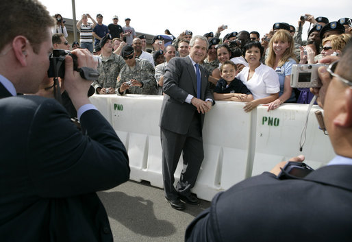 President George W. Bush poses for a photo with military personnel and their families before departing Fort Irwin, Calif., Wednesday, April 4, 2007. White House photo by Eric Draper