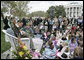 Actor Stephen Baldwin asks a little reader for some help as he reads the children's book, "The Jolly Postman," by Alan Alhberg Monday, April 9, 2007, on the South Lawn during the 2007 White House Easter Egg Roll. White House photo by Joyce Boghosian