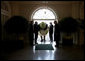 Shrek receives some assistance as he ducks entering the Palm Room of the White House Monday, April 9, 2007. The big guy was on hand to participate in the 2007 White House Easter Egg Roll. White House photo by David Bohrer