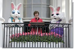 Mrs. Laura Bush addresses South Lawn visitors to the 2007 White House Easter Egg Roll from the Truman Balcony Monday, April 9, 2007. "In Washington, we know spring has arrived when the White House lawn is filled with children for the Easter Egg Roll," said Mrs. Bush. "So thank each one of the children for coming. Thank you for bringing an adult with you." White House photo by Shealah Craighead
