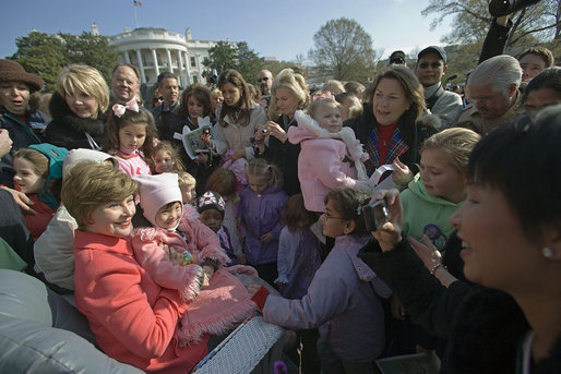 Mrs. Laura Bush poses for pictures with children after reading aloud the children's book, "Duck For President," by Doreen Cronin and Betsy Lewin Monday, April 9, 2007, at the 2007 White House Easter Egg Roll on the South Lawn. White House photo by Shealah Craighead