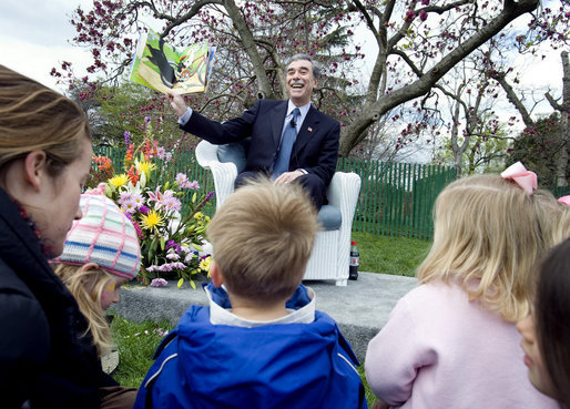 Commerce Secretary Carlos Gutierrez reads from the children's book, "Duck on a Bike," by David Shannon Monday, April 9, 2007, during the 2007 White House Easter Egg Roll on the South Lawn. White House photo by David Bohrer