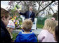 Commerce Secretary Carlos Gutierrez reads from the children's book, "Duck on a Bike," by David Shannon Monday, April 9, 2007, during the 2007 White House Easter Egg Roll on the South Lawn. White House photo by David Bohrer