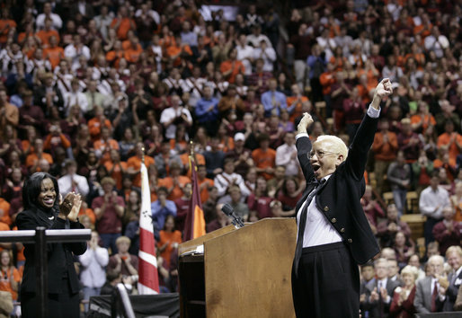 Nikki Giovanni, renown poet and Virginia Tech English professor, raises her arms in cheer after offering remarks Tuesday, April 17, 2007, during a Convocation honoring the victims of Monday's deadly shooting. "We are the Hokies! We will prevail! We will prevail! We are Virginia Tech!" Ms. Giovanni said, bringing the audience to its feet and into spontaneous cheer. White House photo by Eric Draper