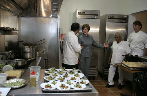 Mrs. Laura Bush tours the new kitchen at Willie Mae’s Scotch House Thursday, April 19, 2007, in New Orleans, La. The restaurant was destroyed in Hurricane Katrina. Pictured with Mrs. Bush are, from left, Willie Mae’s grandson Ronnie Seaton, Sr., 93-year-old Willie Mae Seaton, and Chef John Besh of Restaurant August. White House photo by Shealah Craighead