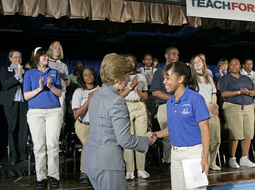 Mrs. Laura Bush thanks 11th grade student Ashley Joplin, who introduced the First Lady, at the New Orleans Charter Science and Mathematics High School Thursday, April 19, 2007, in New Orleans, La. "According to the United States Department of Education, more than 1,000 private and public schools in the Gulf Coast region were damaged or destroyed," said Mrs. Bush. "Today, 94 percent of the schools in Louisiana have reopened. In New Orleans, 58 public schools are now up and running." White House photo by Shealah Craighead