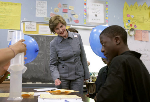 Mrs. Laura Bush watches a student demonstrate an experiment with static electricity and a balloon at the New Orleans Charter Science and Mathematics High School Thursday, April 19, 2007, in New Orleans, La. Originally created as a half-day program in 1992, the program reorganized itself as The New Orleans Charter Science and Mathematics High School after Hurricane Katrina sent the city’s school system into a state of crisis. White House photo by Shealah Craighead