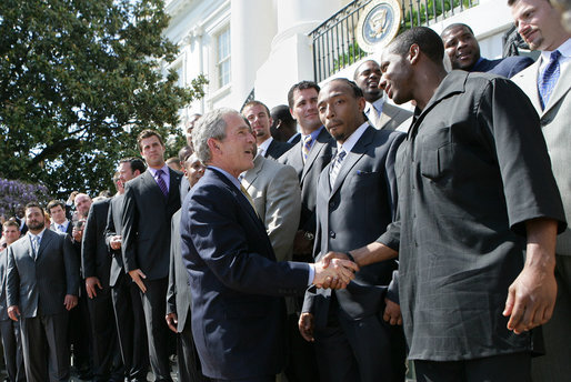 President George W. Bush greets members of the Indianapolis Colts football team at the White House ceremony to honor the Super Bowl XLI champions Monday, April 23, 2007. White House photo by Eric Draper