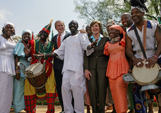President George W. Bush and Mrs. Laura Bush stands with the Kankouran West African Dance Company after delivering remarks during a ceremony marking Malaria Awareness Day Wednesday, April 25, 2007, in the Rose Garden. "The American people, through their government, are working to end this epidemic,"said President Bush. "In 2005, President Bush announced the President's Malaria Initiative -- a five-year, $1.2 billion program to combat malaria in the hardest-hit African nations." White House photo by Eric Draper