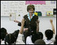Mrs. Laura Bush talks with first grade students about Malaria Awareness Day and the book ‘Nets are Nice,’ during her visit Wednesday, April 25, 2007 to the Friendship Public Charter School on the Woodridge Elementary and Middle School campus in Washington, D.C. White House photo by Shealah Craighead