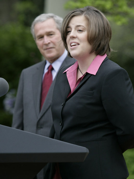 President George W. Bush listens as Andrea Peterson, 2007 National Teacher of the Year, speaks during ceremonies Thursday, April 26, 2007, in the Rose Garden. Said the President, "This is a special day for all who care deeply about education, because we fully understand that without a good teacher it's hard to achieve national goals and objectives." White House photo by Eric Draper