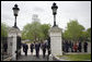 President George W. Bush and Mrs. Laura Bush enter the White House North Lawn with Japanese Prime Minister Shinzo Abe and his wife Mrs. Akie Abe during their walk from the Blair House Thursday, April 26, 2007. President Bush and Mrs. Bush hosted a social dinner for the Prime Minister and his wife. White House photo by Eric Draper
