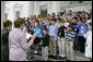Mrs. Laura Bush is joined by Mary Bomar, director of the National Park Service, as a group of youngsters participating in the 2007 Bring Your Child to Work Day at the White House take the Junior Ranger pledge Thursday, April 26, 2007, on the steps of the North Portico of the White House. The Junior Ranger program, sponsored by the National Park Service, educates young people about the nation's various and diverse national parks. White House photo by Shealah Craighead
