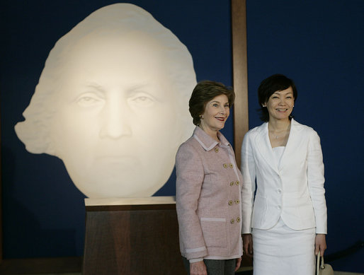 Mrs. Laura Bush and Mrs. Akie Abe, wife of Japanese Prime Minister Shinzo Abe, stand before a portrait of George Washington as they talk to members of the media, following a tour of the Mount Vernon Estate of George Washington Thursday, April 26, 2007, in Mount Vernon, Va. White House photo by Shealah Craighead