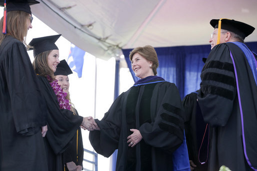 Mrs. Laura Bush congratulates the three Valedictorians of the 2007 graduating class at Pepperdine University's Seaver College Saturday, April 28, 2007, during commencement ceremonies on the Malibu, California campus. White House photo by Shealah Craighead