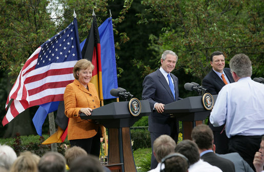 President George W. Bush, European Council President Angela Merkel of Germany and European Commission President Jose Manuel Barroso of Portugal listen to a question Monday, April 30, 2007, during a joint press conference in the Rose Garden. White House photo by Eric Draper
