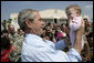 President George W. Bush greets the crowd on hand at MacDill Air Force Base in Tampa Tuesday, May 1, 2007. The President was on hand for a briefing at CENTCOM, and to deliver remarks to the CENTCOM Coalition Conference. White House photo by Eric Draper