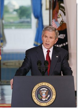 President George W. Bush issues a statement Tuesday, May 1, 2007, regarding his veto of the Iraq War Supplemental. Speaking from Cross Hall in the White House, the President said, "We need to give our troops all the equipment and the training and protection they need to prevail. The need to act is urgent."  White House photo by Eric Draper