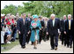 Vice President Dick Cheney accompanies Her Majesty Queen Elizabeth II of England Friday, May 4, 2007, on a tour of Jamestown Settlement in Williamsburg, Virginia. The Queen's visit comes during the 400th anniversary celebrations at Jamestown, the first permanent English settlement in North America. White House photo by David Bohrer